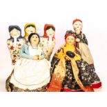 Three Russian cloth Babushka coffee or tea cosies, with painted faces, one knitting and one