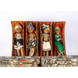 Four AboSisi Sisters of Africa doll, made from old newspapers, dressed in tribal costumes, in