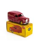 A Dinky Toys 471 Austin 'Nestles' Van, dark red body, yellow hubs, 'Nestles' logo, in original