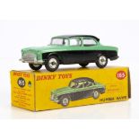 A Dinky Toys 165 Humber Hawk, black lower body and roof, pale green upper body, spun hubs, in