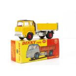 A Dinky Toys 435 Bedford TK Tipper, yellow cab, black roof, silver back, yellow sides, red plastic
