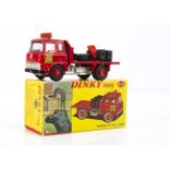 A Dinky Toys 425 Bedford TK Coal Wagon, red body and plastic hubs, blue interior, six bags, scales