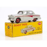A Dinky Toys 176 Austin A105 Saloon, pale grey body, red panel line and hubs, in original box, E,
