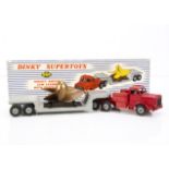 A Dinky Supertoys 986 Mighty Antar Low Loader With Propeller, red cab, no glazing, grey low-