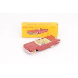 A French Dinky Toys 555 Ford Thunderbird, dark red body, pale green interior, driver, black