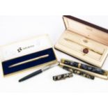 A small collection of fountain and other pens, including a boxed blue mottled Conway Stewart No. 27,