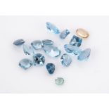 A collection of loose blue a sherry coloured example, pear, oval, calf head and others 23 cts