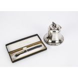 An Edwardian silver filled novelty inkwell and a Sheaffer fountain pen, the inkwell in the form of a