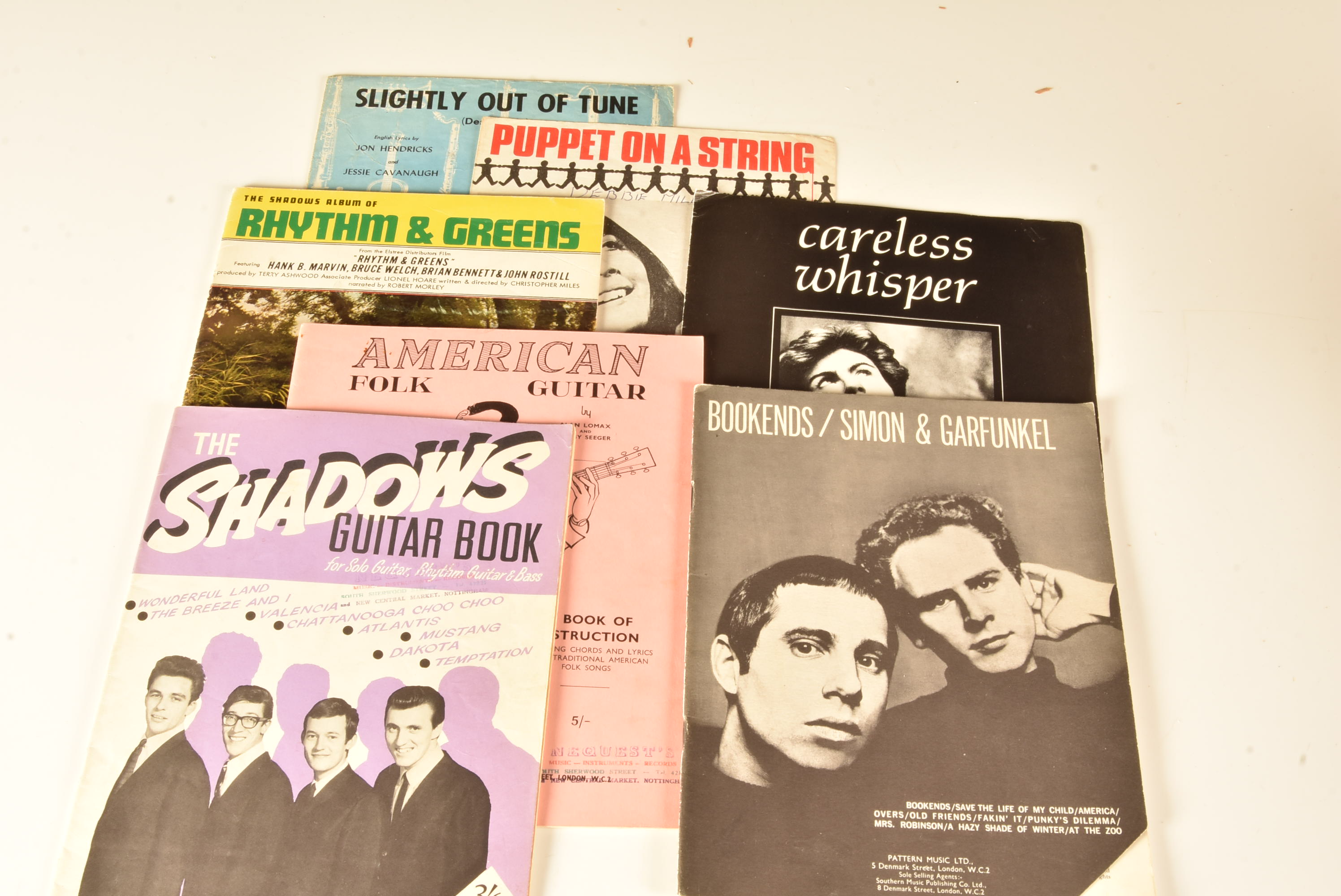 Sheet Music / Guitar Tab Books, approximately twenty-five pieces of sheet Music and approximately