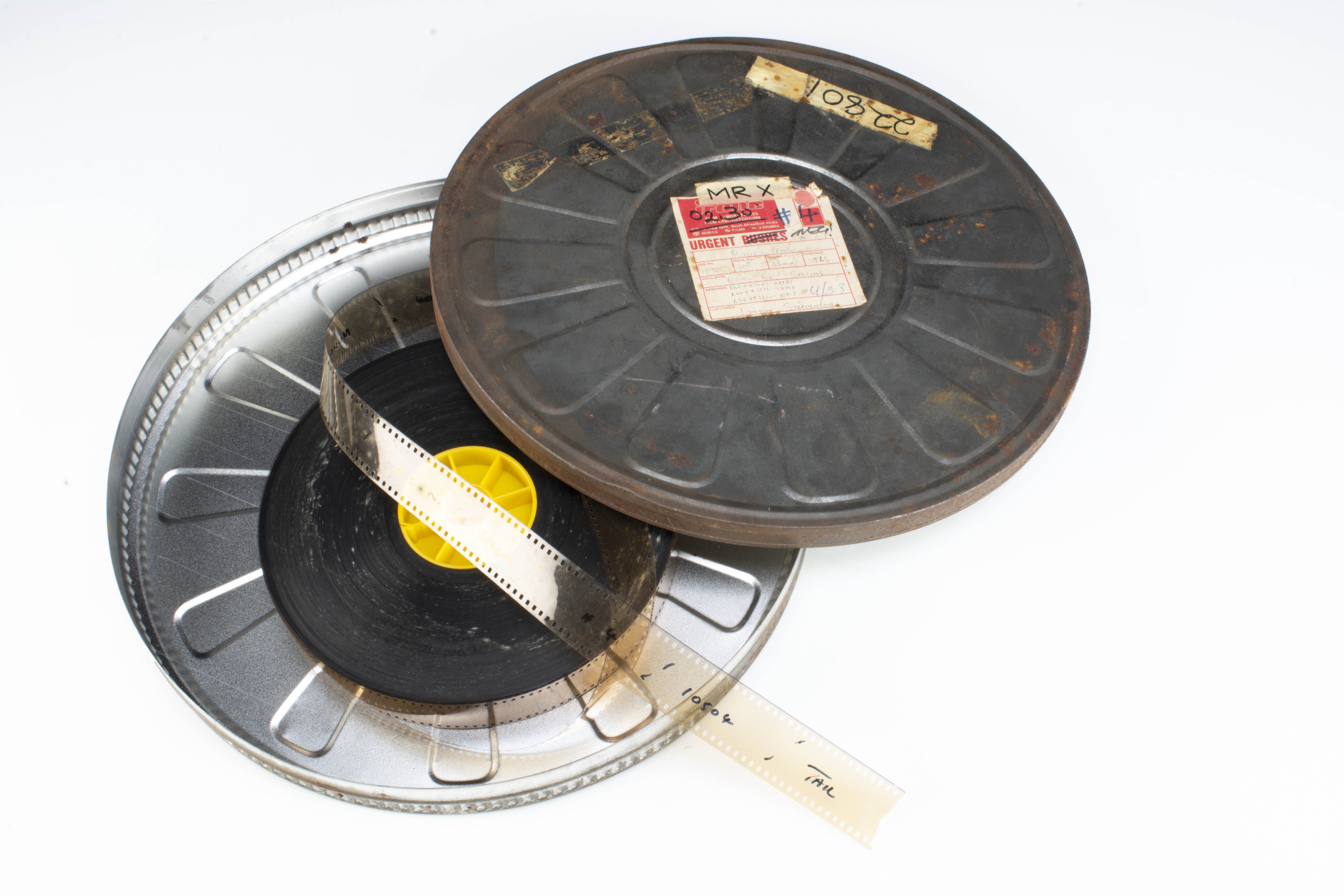 Film Reel / Lynton Stephenson, a 35mm film reel with the label on tin indicating 'Music Promo' -