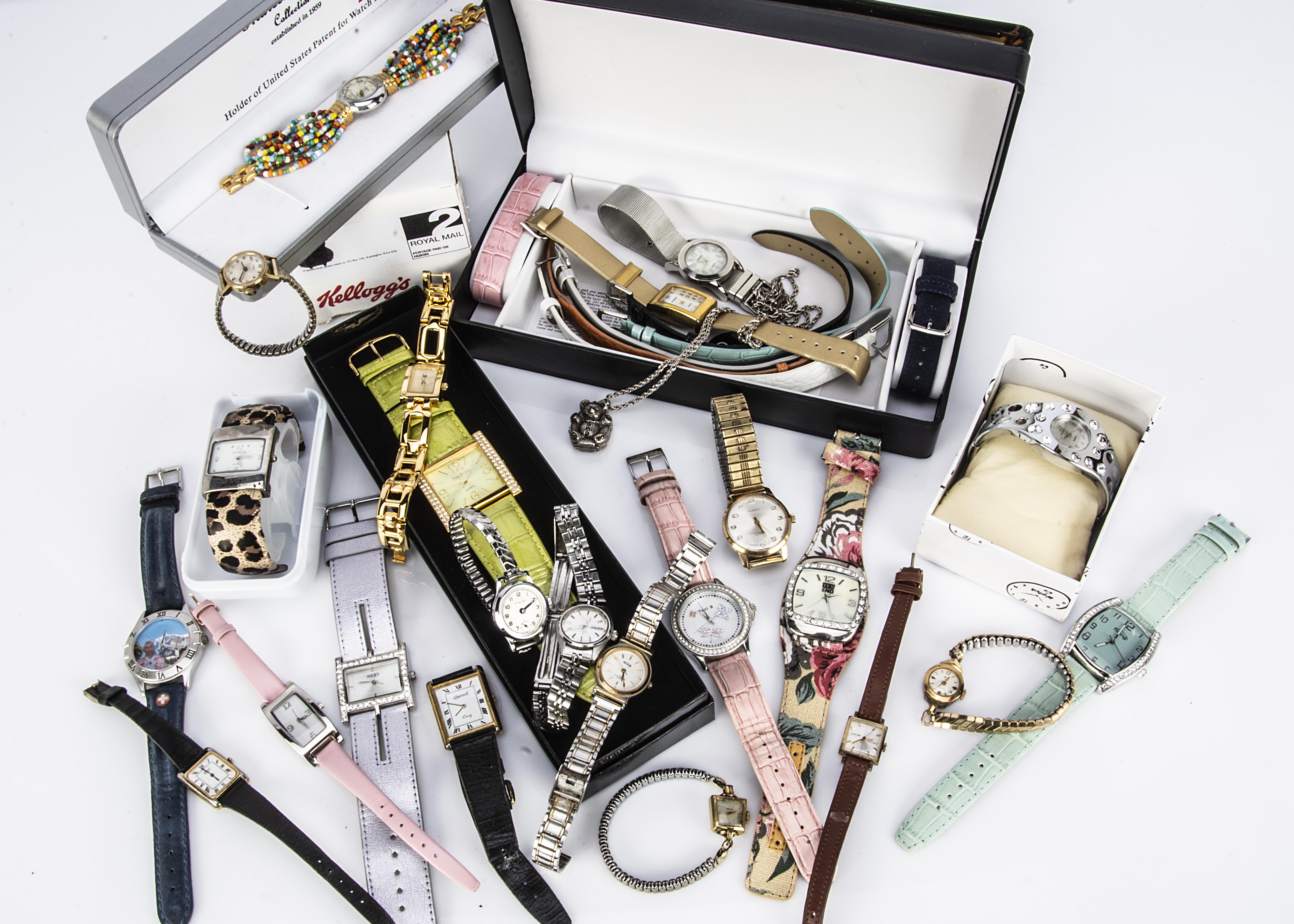 A collection of watches, including a cute silver Teddy bear pendant watch on chain, a Seiko