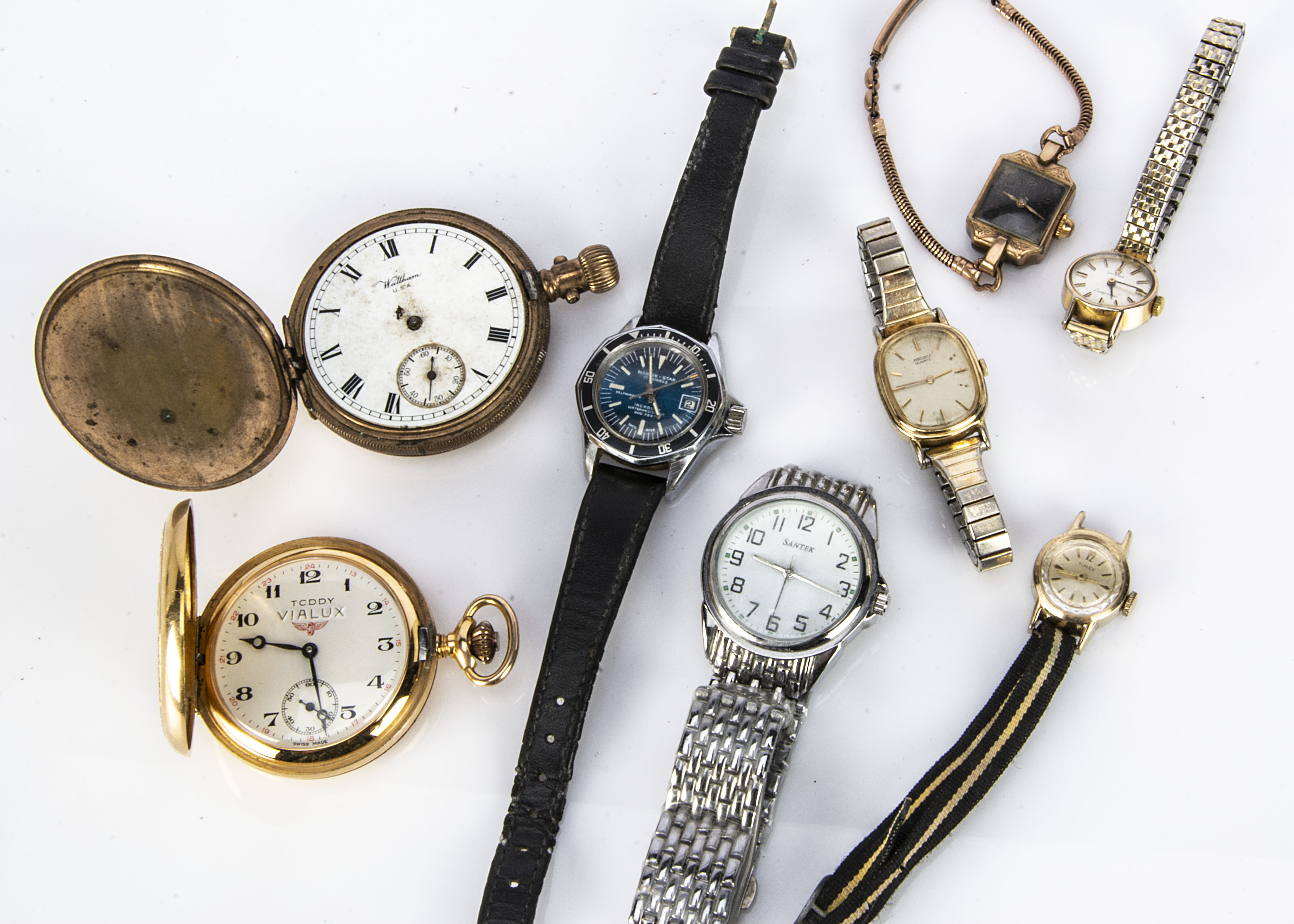 A small collection of watches, including a lady's or boys Marine Star diver's wristwatch, a Vialux