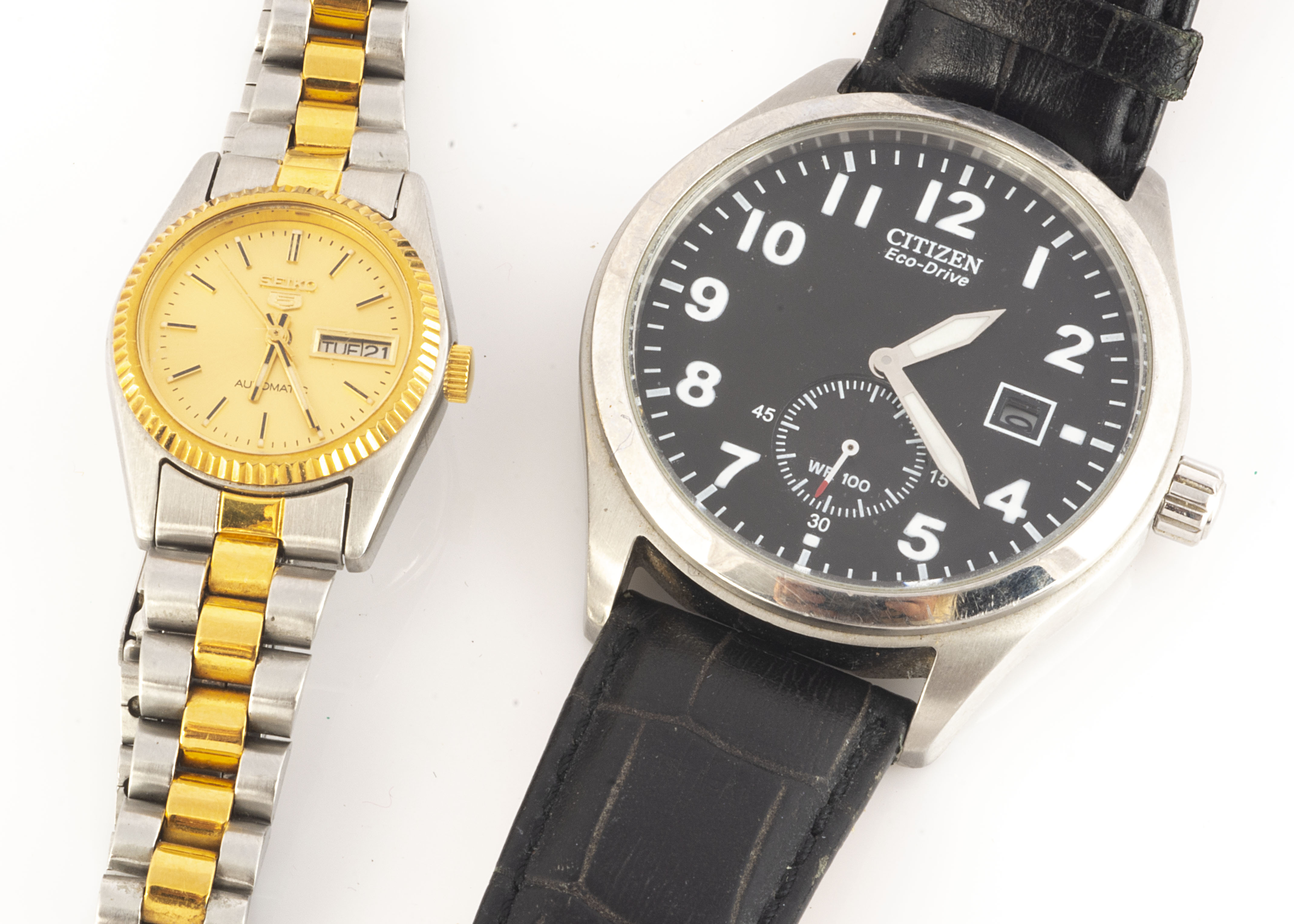 Two modern wristwatches, including a Seiko 5 automatic stainless steel and gilt lady's example,