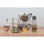 A large collection of silver plate and other metal items, including a teapot, milk jug, metal topped