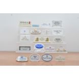 A collection of British ceramic advertising plaques, including Portmeirion, Royal Winton, Royal