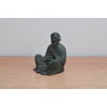 A 20th century bronzed figure of a Chinese man, holding a lamp, with some wear, 11.5cm high