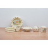 A collection of Royal Doulton bunnykins ceramics, comprising three different shaped bowls, a money