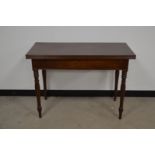 A Victorian mahogany fold open side table/tea table, rectangular top, one end AF, raised on turned