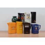 A collection of eight ceramic branded water jugs, comprising two Cutty Sark, Glen Ord, Black Bush,