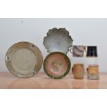 A collection of 20th century studio pottery kitchen items, comprising a stoneware glazed bowl by