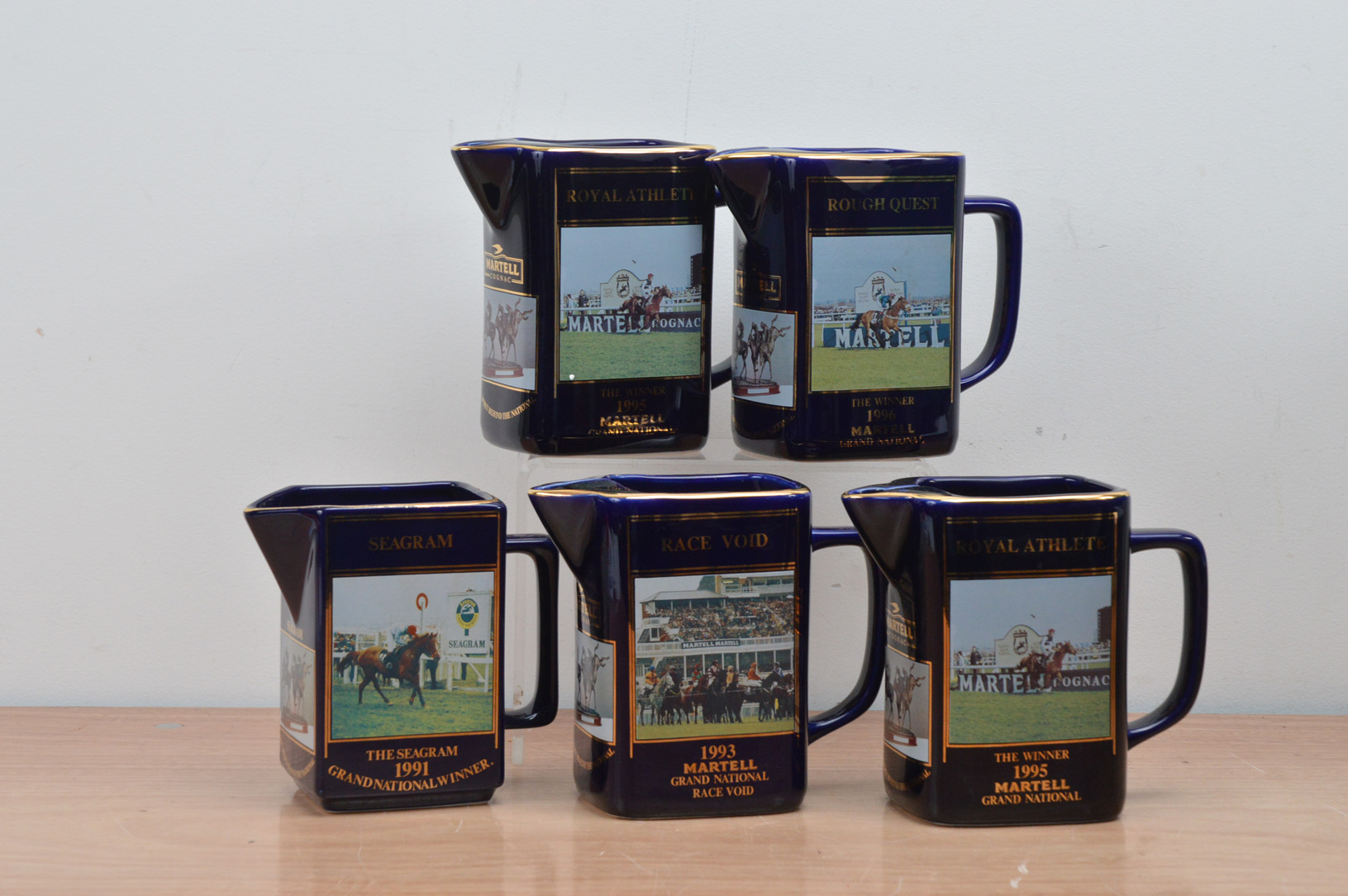 Five Martell Grand National water jugs, for the years 1991, 1993, two for 1995 and 1996 (6)