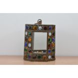 An early 20th century bullseye lantern, metal frame in a hexagonal shape, with multi coloured glass,