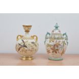 A Royal Worcester ceramic cream and gilt twin handled vase, with flying bird decoration, marked to