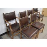 A set of eight 20th century wood and leather dinning room chairs, raised on turned supports, one AF,