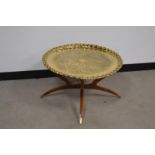 A 20th century Middle Eastern brass tray and stand, 68cm H x 44cm W