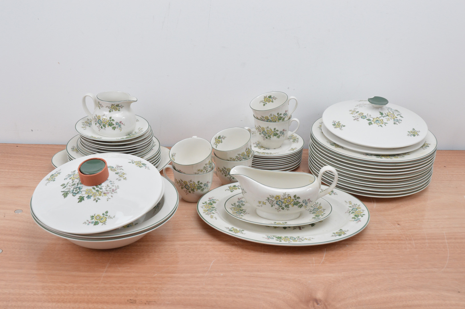 A Royal Doulton Campagna part dinner service with tea and coffee wares, with a floral design,