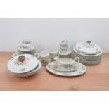 A Royal Doulton Campagna part dinner service with tea and coffee wares, with a floral design,