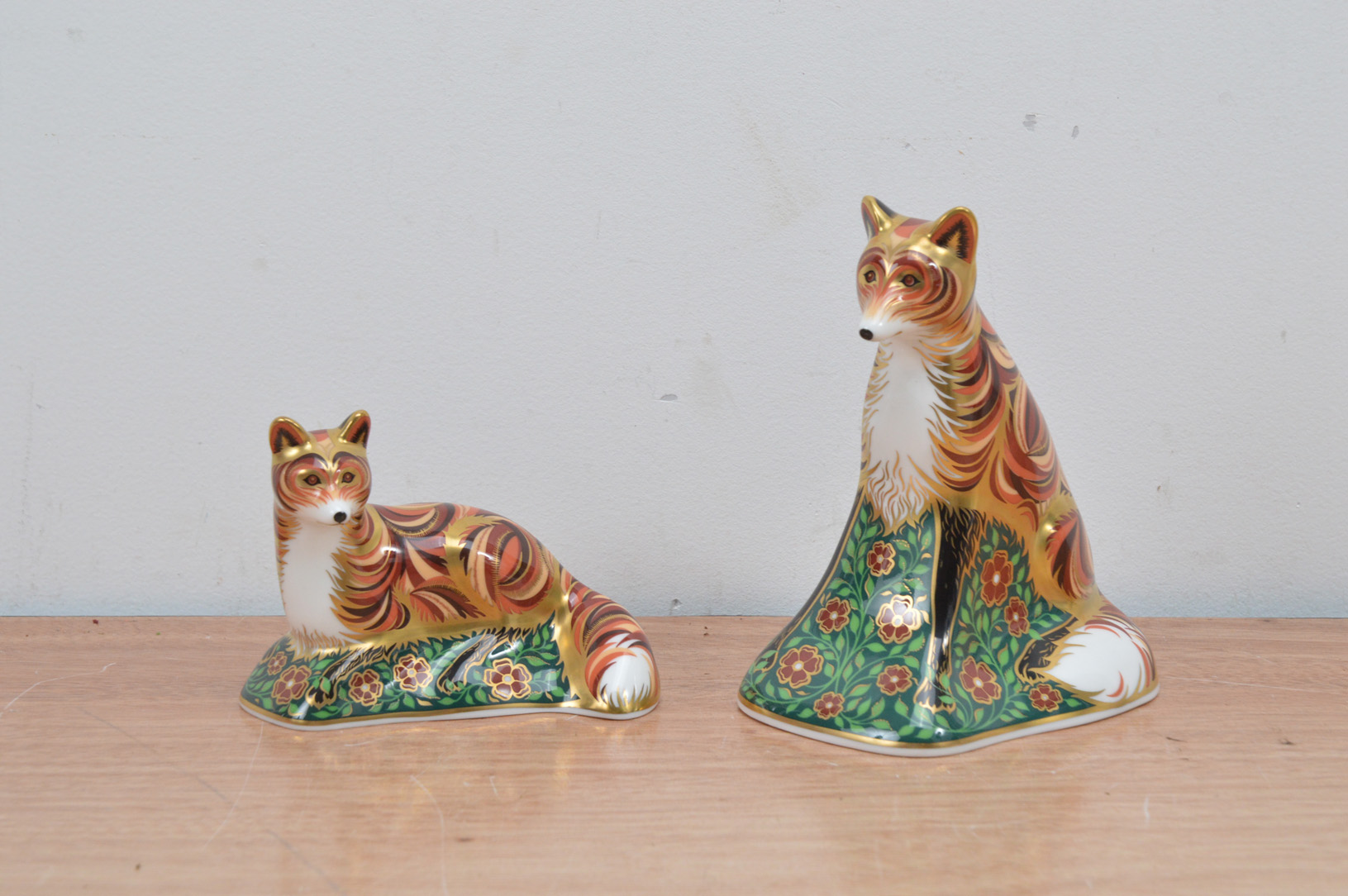 Two Royal Crown Derby bone china fox paperweights, comprising The Devonian Vixen, and the Devonian