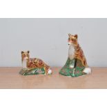 Two Royal Crown Derby bone china fox paperweights, comprising The Devonian Vixen, and the Devonian