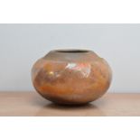 Gisele Buthod-Garcon (British b. 1954), a baluster stoneware bowl, silvered base, with orange lustre