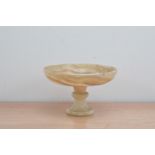 A 19th century Grand Tour marble footed bowl/centre-piece, the bowl cracked and repaired, turned