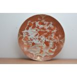 A large early 20th century porcelain charger/bowl, decorated in the Japanese Satsuma style, with