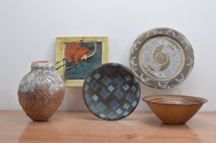 A collection of 20th century studio pottery, comprising a stoneware platter by Ann Wrighton, incised