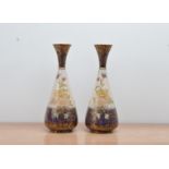 A pair of 20th century ceramic Carlton Ware vases, with floral designs, some minor condition