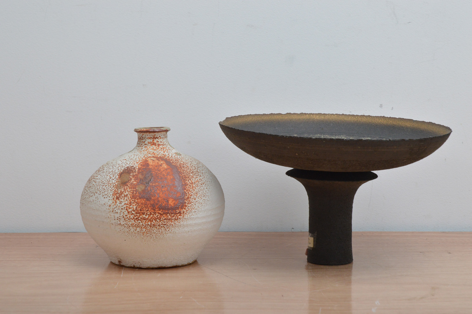 Two items of studio pottery, comprising a soda glazed earthenware baluster vase by Alain Rech 14cm