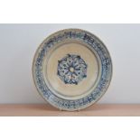 An 18th century Continental blue and white bowl, possibly Spanish, hand painted decoration with some