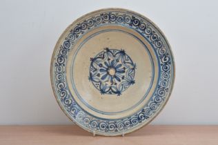 An 18th century Continental blue and white bowl, possibly Spanish, hand painted decoration with some