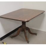 A mid 19th century mahogany, tilt top breakfast table, the rectangular top with moulded and