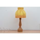 An Albert 'Eagleman' Jeffray carved wooden lamp, with shade, turned oak column with an eagle