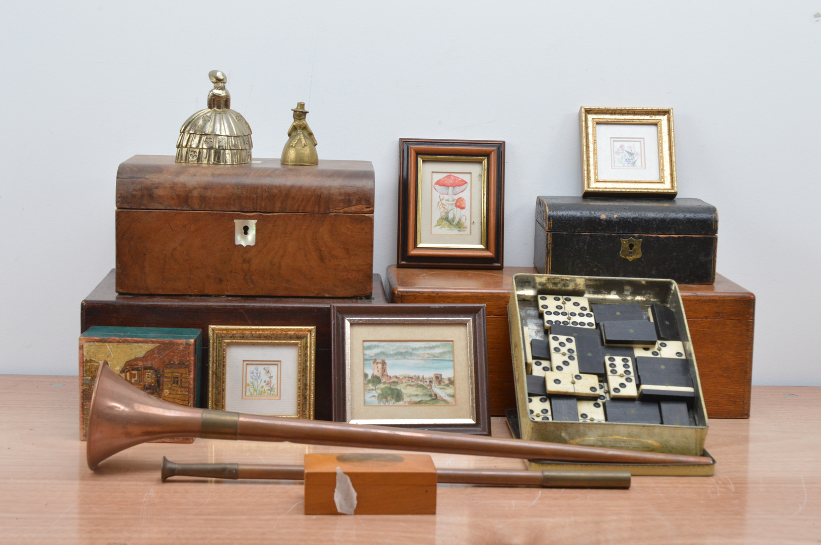 A collection of works of art, including bone dominoes, three wooden boxes, a Jewellery box, brass