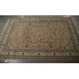 A modern 20th century Pakistani rug, hand woven, with floral design 185cm x 281cm and another