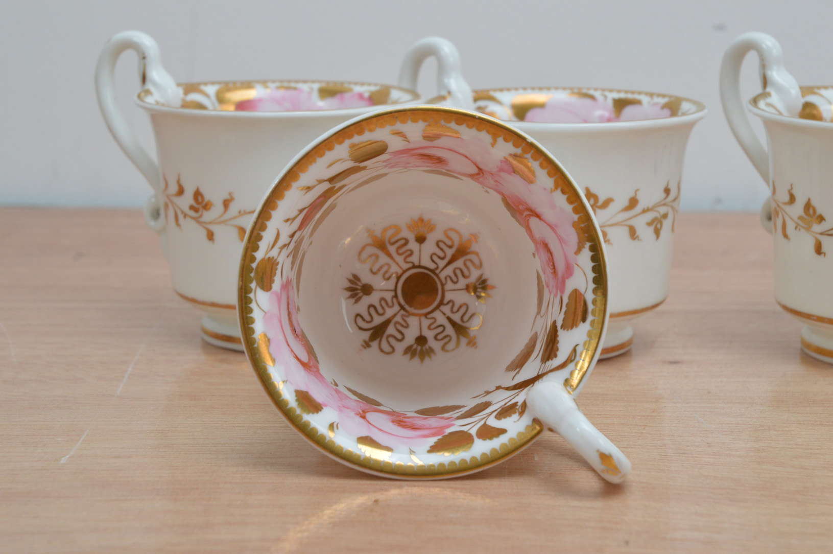 Six early 19th century Spode porcelain tea cups, hand painted floral design with gilt work on a - Image 3 of 4