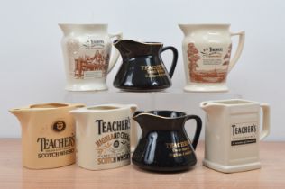 Seven ceramic Teacher's Highland Whisky water jugs, of differing styles and sizes, with some minor