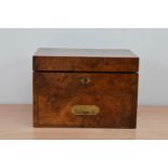 A 19th century burr walnut and mahogany campaign box, with partial fitted interior, brass recessed