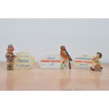 Three Goebel ceramic advertising plaques, two with children the other with a bird (3)