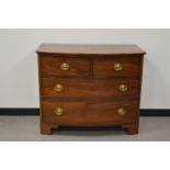 A 19th century flame mahogany bow fronted chest of drawers, two short drawers above graduated long